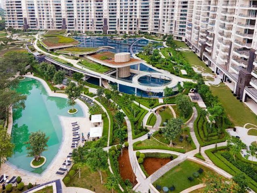DLF Camellias — aerial view of clubhouse pools and gardens