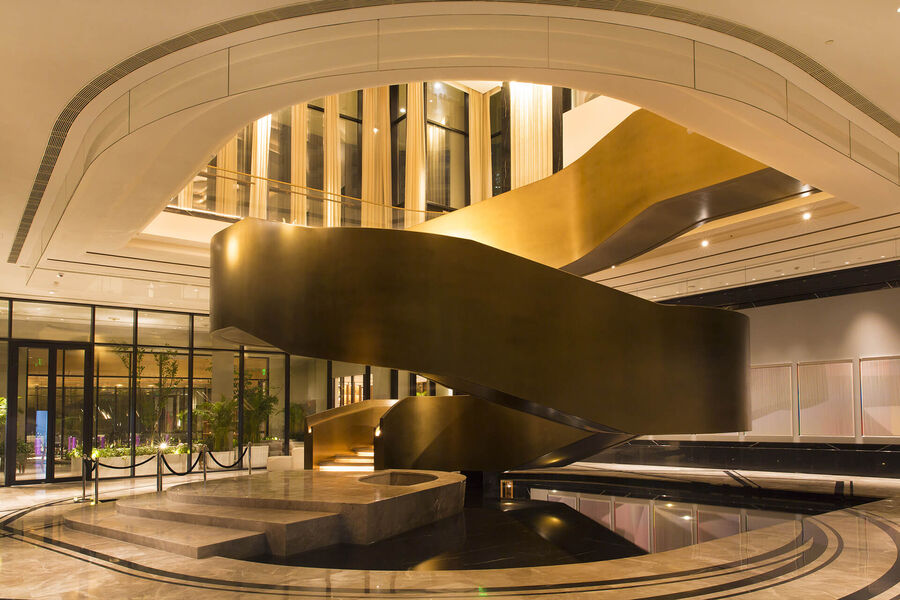 DLF Camellias — clubhouse lobby staircase