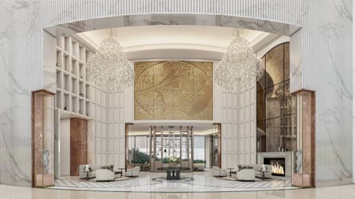Paras The Manor — triple-height club lobby interior